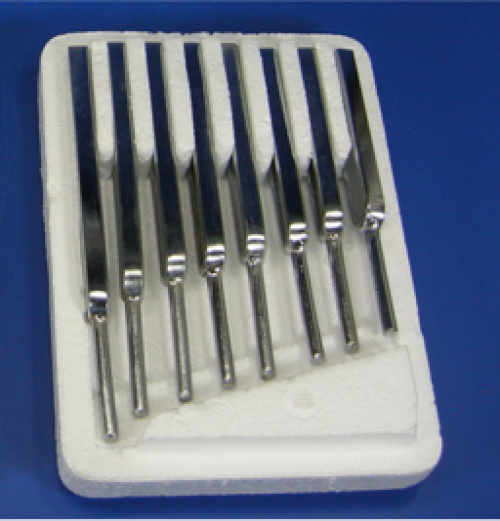 A Set of 6 Tuning Forks in a Box with a Tuning Fork and a Mallet Set