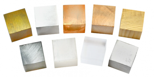 Set of Cubes Made from Different Metals